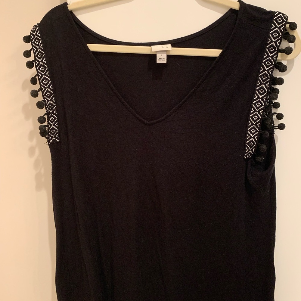 Black top with pom pom details
